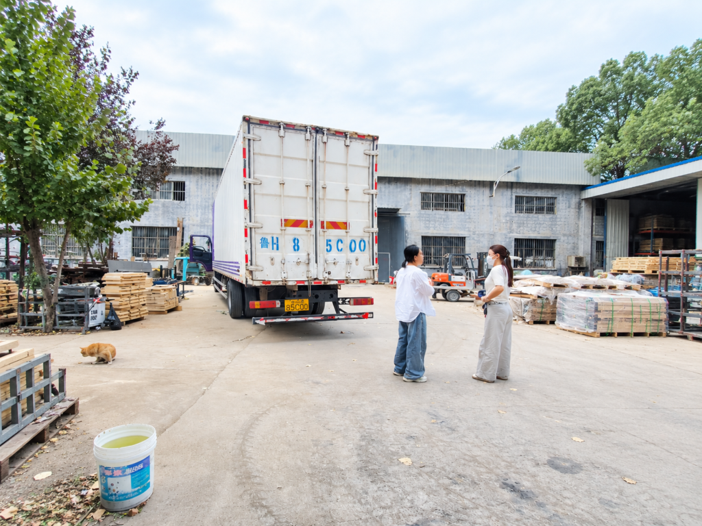 Ciciwood factory loading truck with wooden children's climbing equipment.